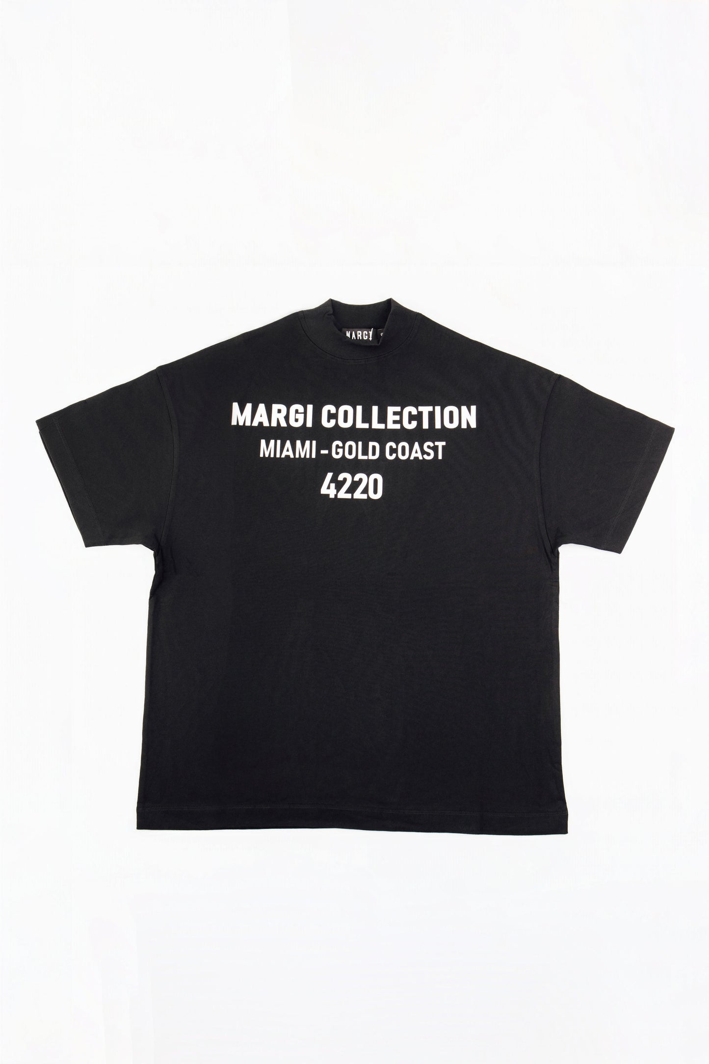 A black short-sleeve t-shirt with white text reading 'MARGI COLLECTION', 'MIAMI - GOLD COAST', and '4220' on the front, displayed flat against a white background.